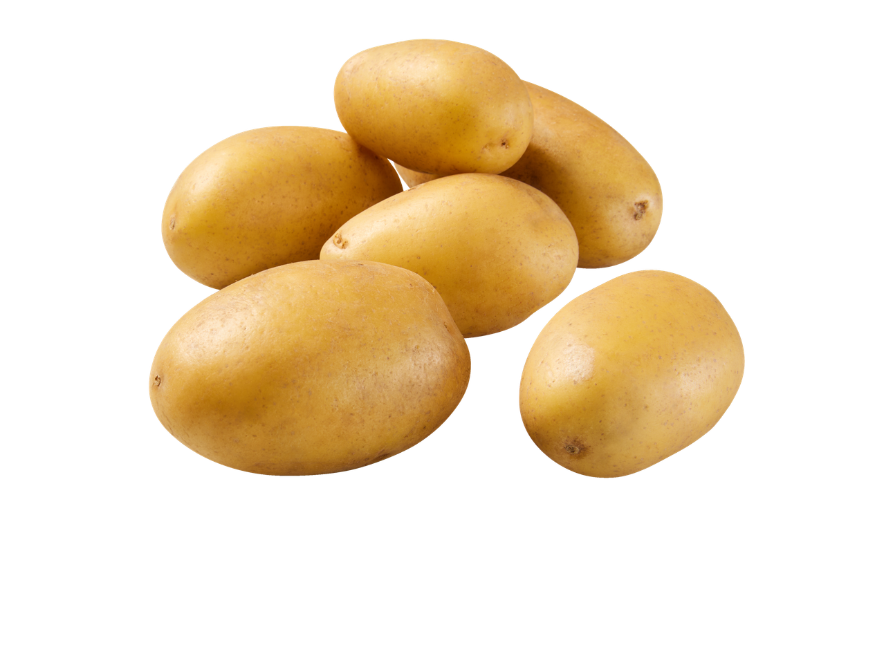 Een stapel lichtgekleurde nieuwe aardappelen op een zwarte achtergrond.