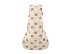 Baby sleeping bag with a pattern of brown bears, white moons, and stars on a light background.