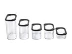 A set of five clear rectangular food storage containers with black lids, varying in height.