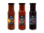 Tre flasker Doe's sauce: mango, tomat og kirsebær.