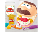 Conjunto de dentista PLAY-DOH® com cabeça de paciente, massa e ferramentas.