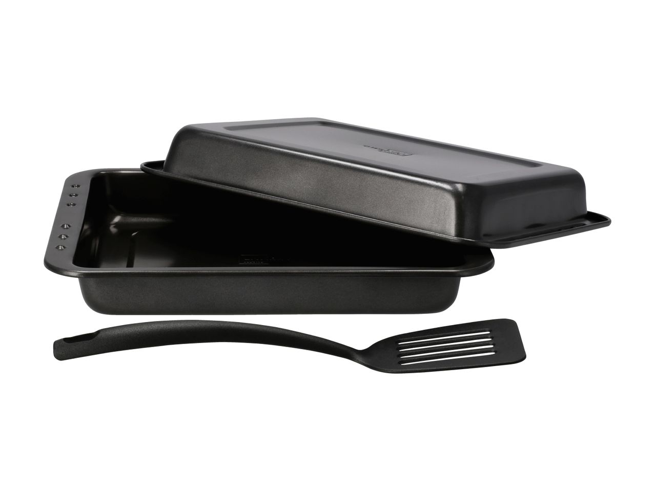 Black rectangular roasting pan with a lid and a black slotted spatula.