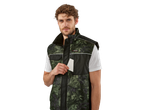 Man wears a Parkside camouflage work vest, holding a white card in his pocket.