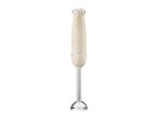 Beige hand blender with stainless steel attachment and 1973 lettering