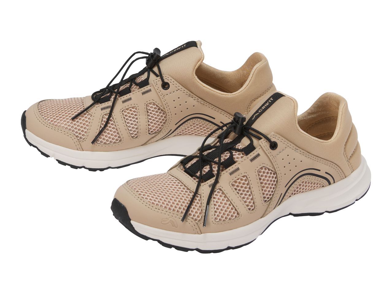 Pair of beige and black athletic shoes with mesh panels and bungee laces