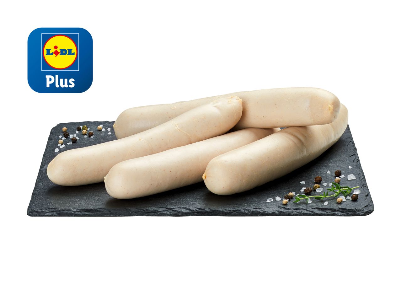 Lidl Plus weiße Würstchen auf Schiefer mit Gewürzen.