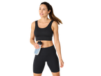 Woman in black sports bra and shorts, water bottle.