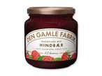 Glas hindbærmarmelade med hvid etiket og illustrationer af hindbær.