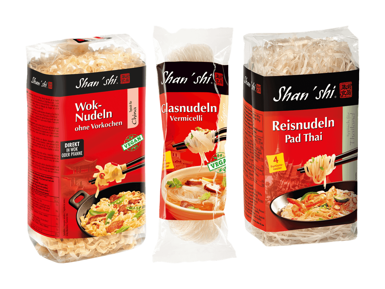Drei Packungen asiatische Nudeln: Wok-Nudeln, Glasnudeln Vermicelli und Reisnudeln Pad Thai.