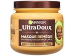 Masque Garnier Ultra Doux pour cheveux secs, bouclés et crépus à l'huile d'avocat et beurre de karité.
