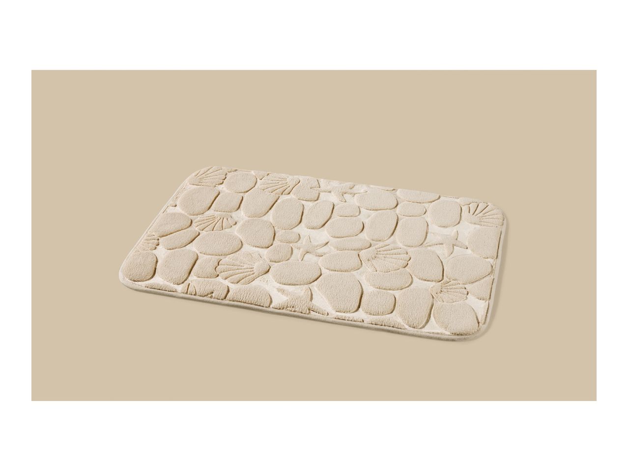 Beige bath mat with a pebble and seashell pattern