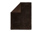 Dark brown faux fur blanket with a folded corner showing a soft backing