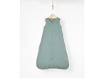 Sage green baby sleeping bag made of muslin.