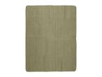 Green rectangular bath mat with a textured surface.