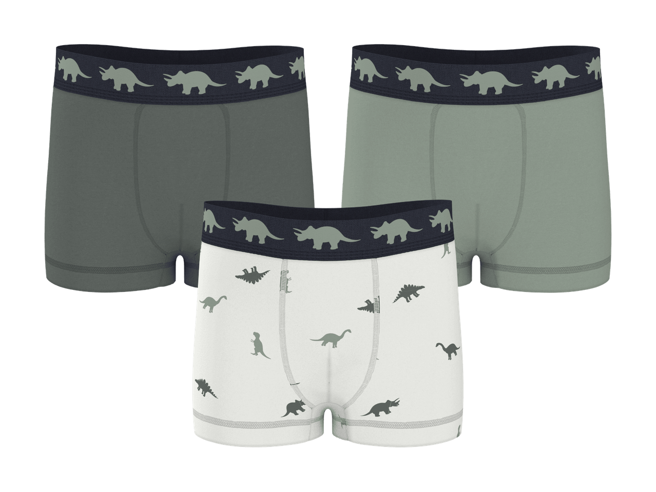 3-pak drengeboksershorts: to grønne med triceratops-mønster på linningen, en hvid med dinosaurmønster.