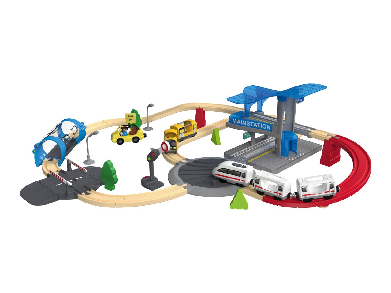 A toy train set with a main station, tracks, a tunnel, a taxi, and a yellow train.
