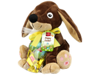 Favorina pehme pruun koerakujuline mänguasi, millel on 'Happy Easter!' silt ja šokolaadimunad.