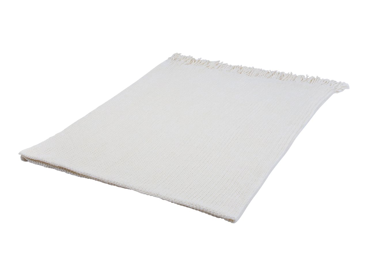 A white knitted blanket with fringe details, folded neatly on a white background.