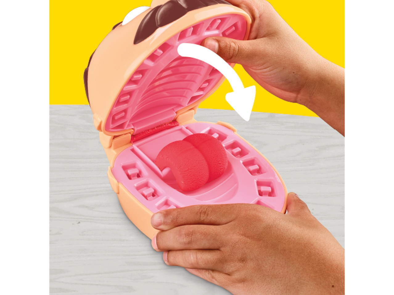 Conjunto de plasticina PLAY-DOH® com molde de boca aberta e língua de argila vermelha.