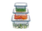 Stack of three clear food storage containers with green peas, red bell peppers, and salad.