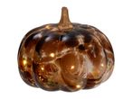 Light-up glass pumpkin decoration with a brown and amber swirled design.