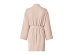 Back view of a light pink bathrobe with a tie belt