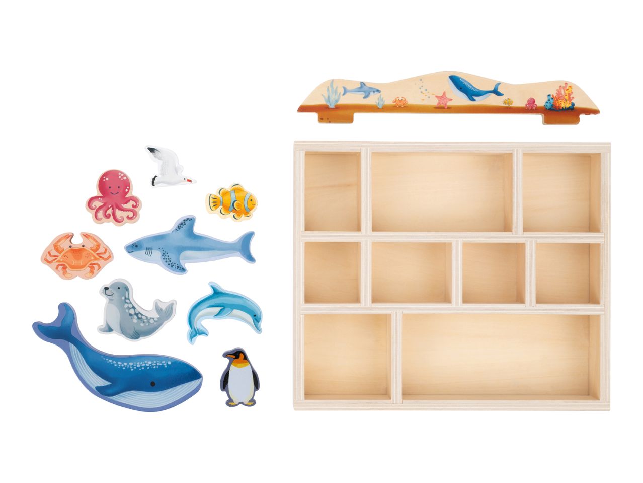 Wooden sea animal figures including a whale, shark, dolphin, octopus, crab, seal, penguin, clownfish, and seagull, with a wooden display shelf and a decorative ocean-themed top piece.