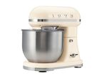 Retro-style cream stand mixer with a stainless steel bowl and 1973 lettering
