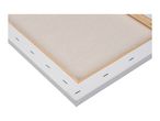 Back view of a stretched canvas with wooden frame and staples