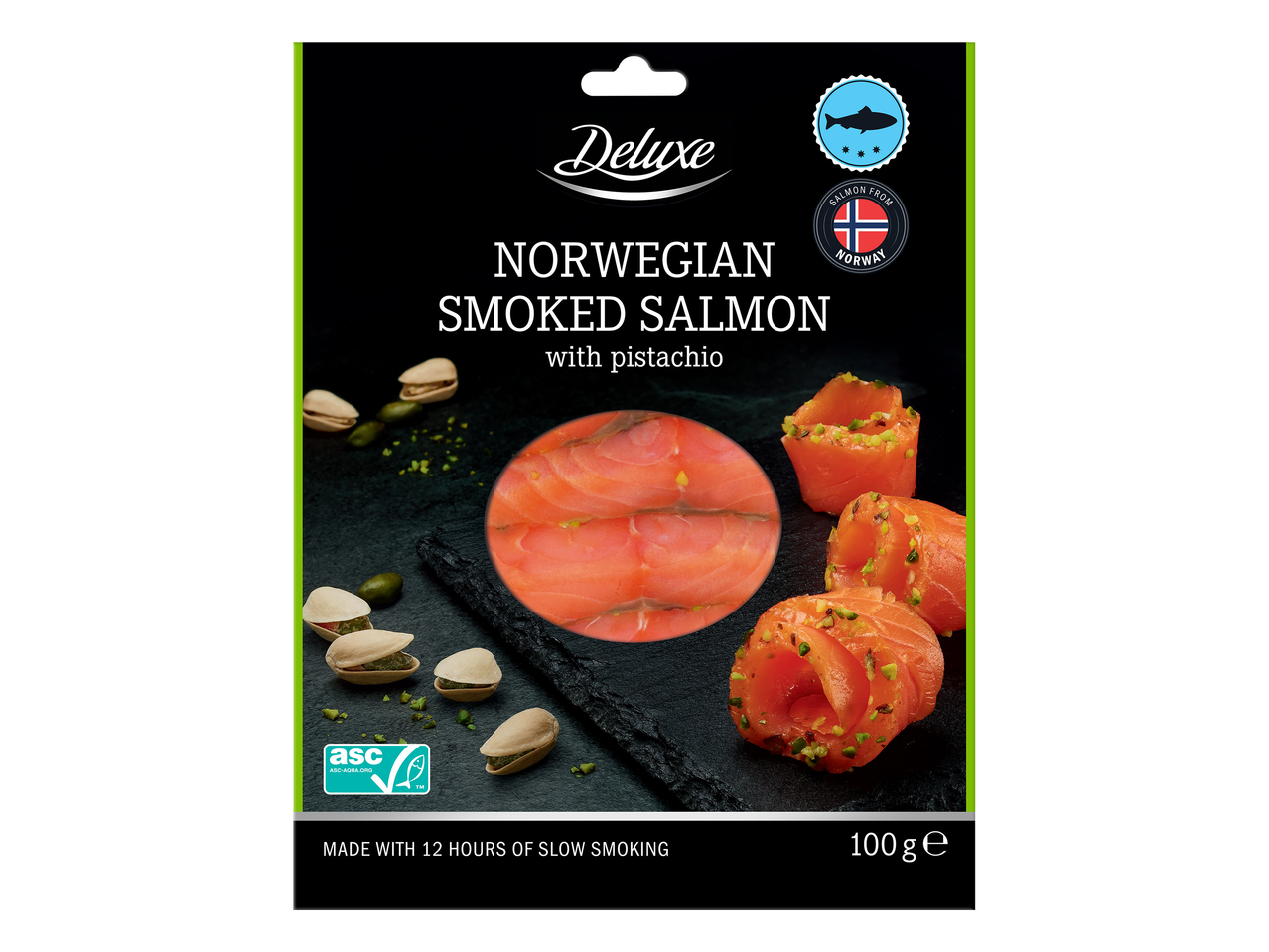 Saumon fumé norvégien avec pistache, emballé, avec la mention 'Made with 12 hours of slow smoking' et '100g e'.
