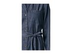 Close-up of a dark blue denim dress with a tied belt and buttons.