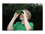 Child in green shirt looking up through green binoculars.
