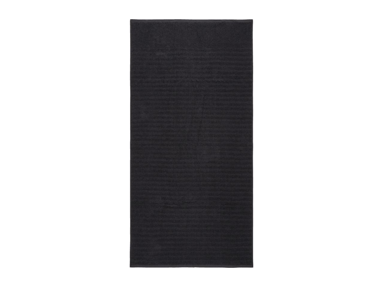 Dark grey bath mat with a ribbed texture