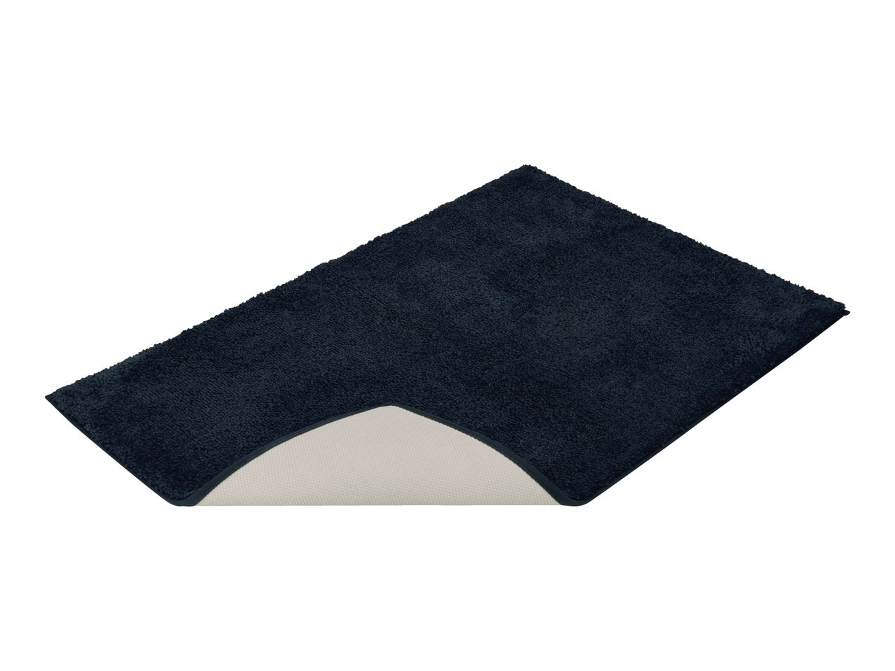 Dark blue bath mat with a cut-out for a toilet, showing the anti-slip backing.