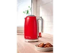Red Silvercrest® kettle on a wooden kitchen countertop, with cookies.