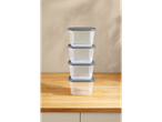 Stacked plastic food storage containers.