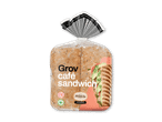 Grov café sandwich i emballage med billede af en sandwich med avocado og tomat.