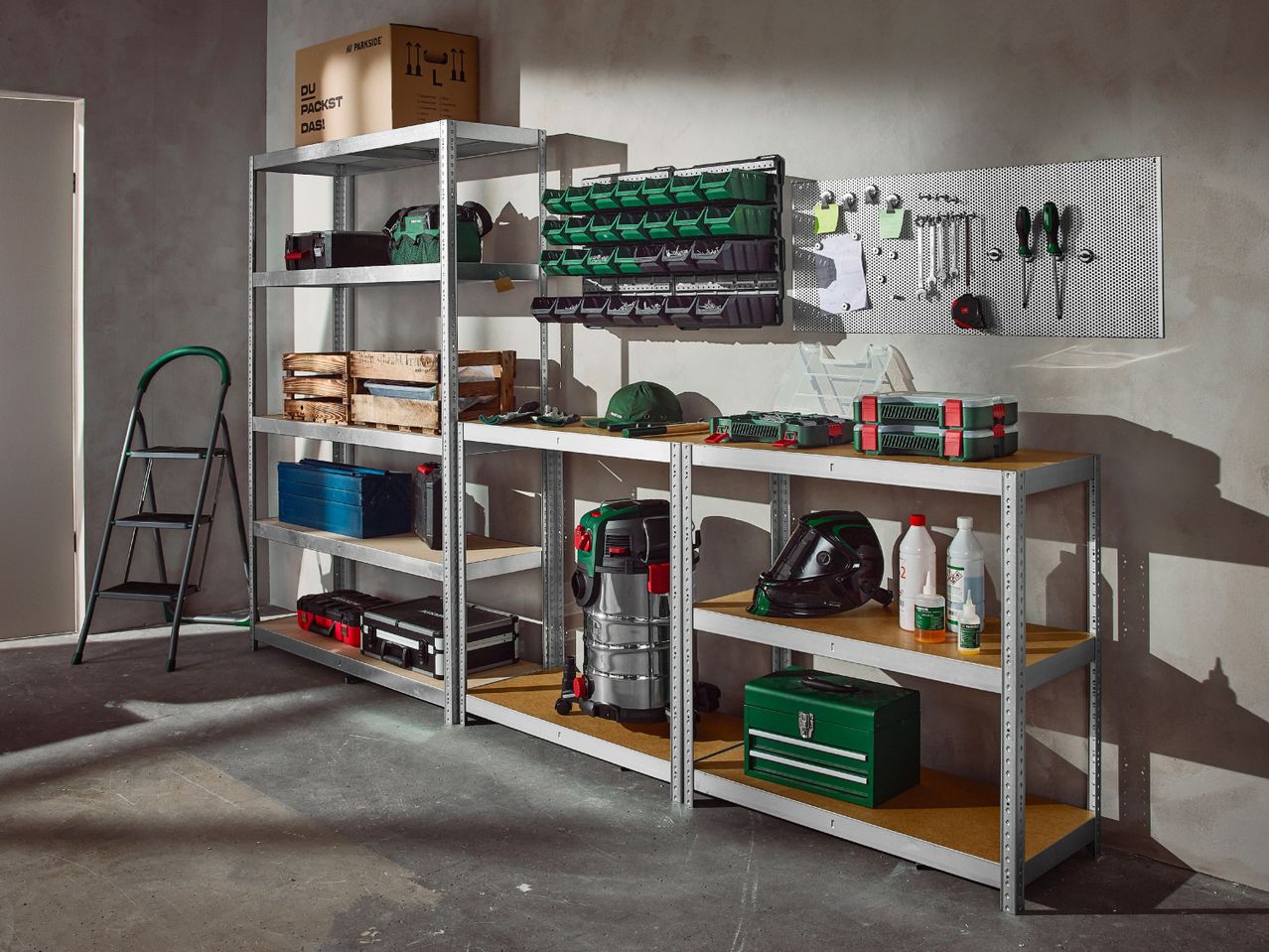 Garage shelving unit with various tools, storage boxes, and a step ladder.