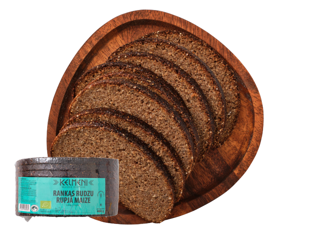 Šķēlēs sagriezta rupjmaize uz koka dēļa ar iepakotu maizes klaipu priekšplānā.