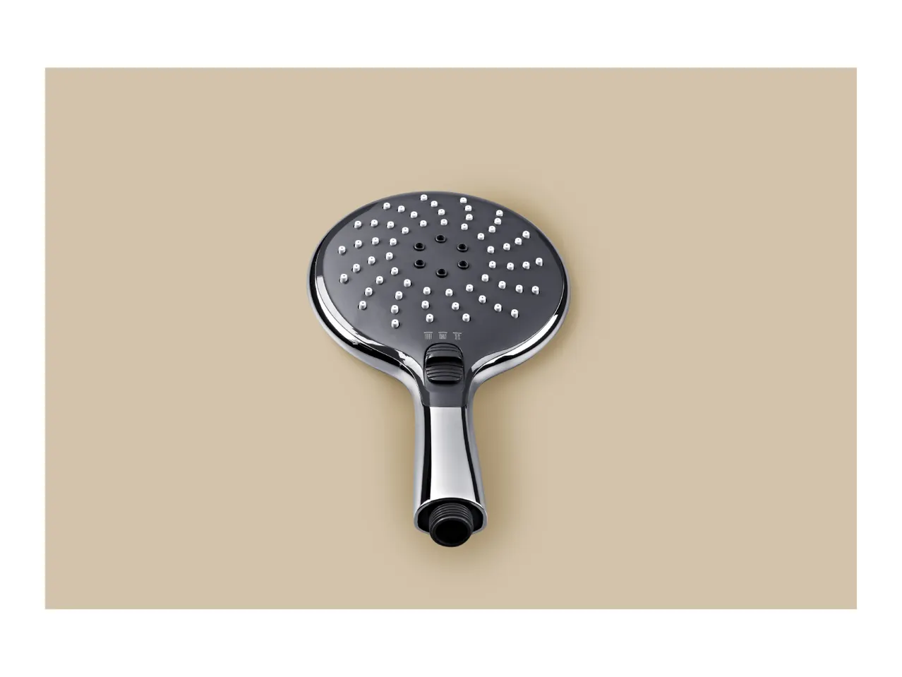 Chrome and dark grey shower head with multiple spray settings on a beige background.