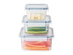 A stack of three clear plastic food storage containers with gray lids, filled with vegetables.