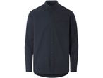 A dark blue long-sleeved button-down shirt with a chest pocket.