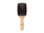 A wooden paddle hairbrush with black bristles and a brand logo on the handle.