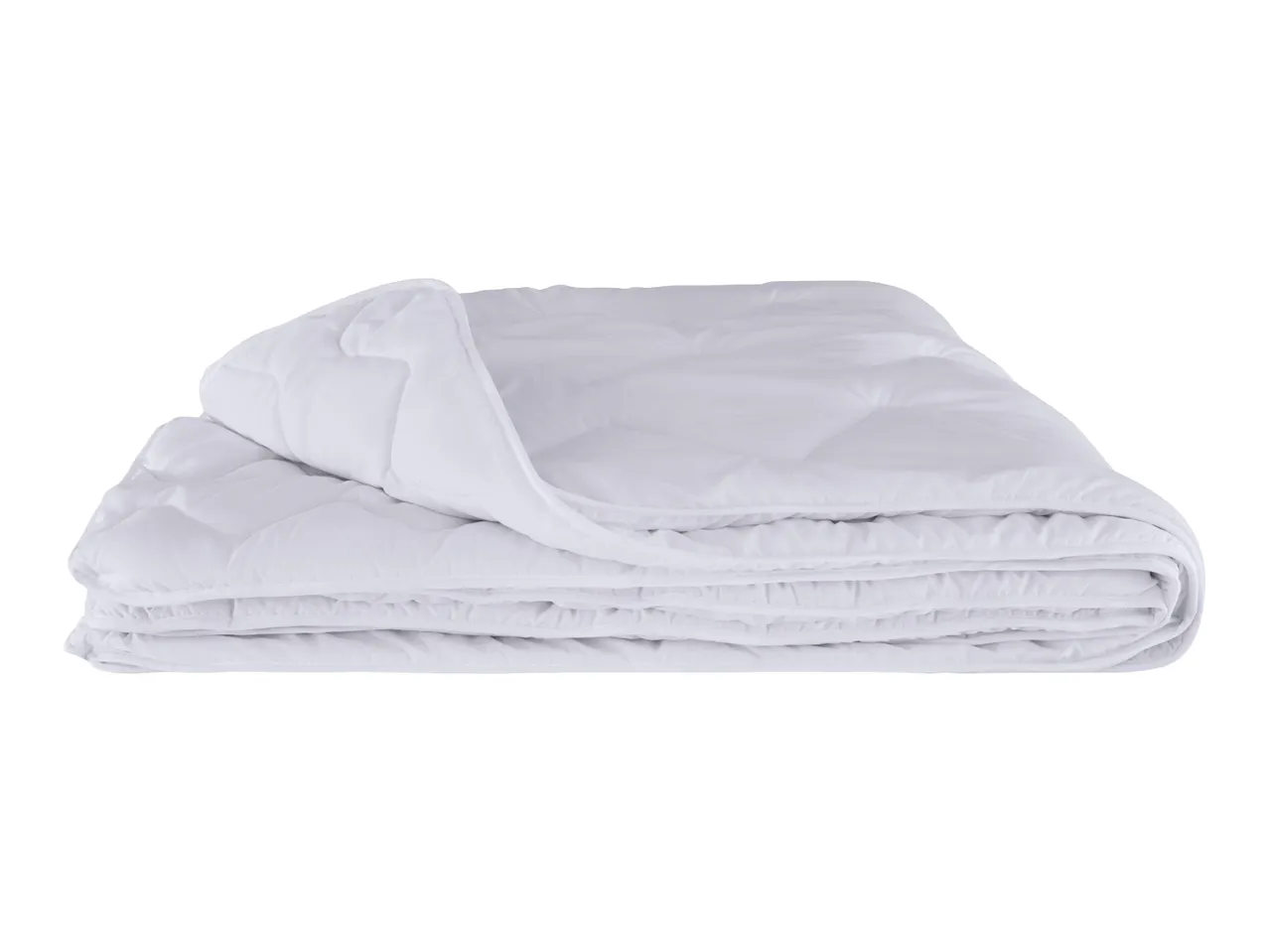 Folded white quilted duvet or comforter