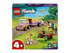 LEGO Friends set 42634 featuring a purple and yellow vehicle, horses, and two minifigures.