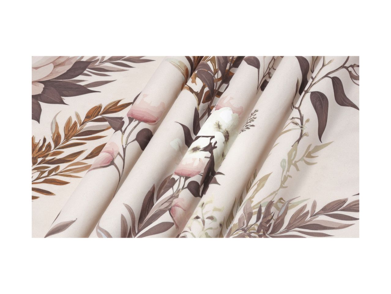Close-up of folded fabric with a floral and leaf pattern in muted tones