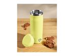 Lime green travel mug with lid and chocolate chip cookies on a wooden surface.
