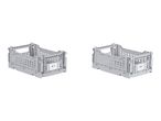 Two light grey foldable storage crates with a label showing '#1' on each.
