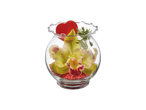 Glass vase with a yellow orchid, red heart, and green foliage on red pebbles.