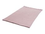 A light pink knitted blanket or throw with fringed edges.